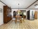 Inviting dining room featuring decorative lighting and tile flooring at 14321 113Th Ave, Largo, FL 33774