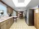 Eat in kitchen with tile floors, stainless steel appliances, and natural lighting at 14321 113Th Ave, Largo, FL 33774