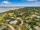 Breathtaking aerial view of a beautiful neighborhood near a glistening bay at 1470 Serpentine S Dr, St Petersburg, FL 33705