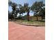 Charming single-story home with mature trees and a well-maintained lawn at 1470 Serpentine S Dr, St Petersburg, FL 33705