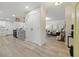 Inviting living room featuring hardwood floors and an open concept layout at 1470 Serpentine S Dr, St Petersburg, FL 33705
