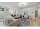 Comfortable living room offering plenty of natural light and neutral decor, creating a welcoming atmosphere at 1470 Serpentine S Dr, St Petersburg, FL 33705