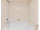 All white bathtub and shower with new fixtures and tile at 1485 Lakeview Rd # 19, Clearwater, FL 33756