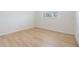 Bright bedroom features new flooring, clean, neutral walls and base trim at 1485 Lakeview Rd # 19, Clearwater, FL 33756