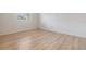 Bright bedroom features new flooring, clean, neutral walls and base trim at 1485 Lakeview Rd # 19, Clearwater, FL 33756