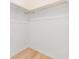 A walk in closet with ample storage and new laminate flooring at 1485 Lakeview Rd # 19, Clearwater, FL 33756