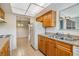 Efficient kitchen with tile flooring and views into the dining area at 1485 Lakeview Rd # 19, Clearwater, FL 33756