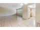 Well-lit living room with views into the kitchen at 1485 Lakeview Rd # 19, Clearwater, FL 33756
