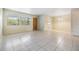 Open living room with tiled floors, new paint, and ample space at 1485 Lakeview Rd # 19, Clearwater, FL 33756