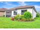 Charming home featuring a well-maintained lawn, a screened lanai and lush landscaping adding privacy at 16723 Blackwater Ter, Bradenton, FL 34202