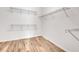 Spacious closet featuring wood-look tile floors and wire shelving at 16723 Blackwater Ter, Bradenton, FL 34202