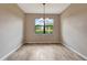 Inviting dining room features wood-look tile flooring, a modern chandelier, and a bright window view at 16723 Blackwater Ter, Bradenton, FL 34202