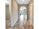 Inviting entryway featuring neutral walls, tile flooring, and an arched doorway at 16723 Blackwater Ter, Bradenton, FL 34202