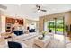 Open-concept living room with plenty of natural light and views of the backyard at 16723 Blackwater Ter, Bradenton, FL 34202