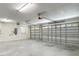 Spacious garage with ample lighting, two garage doors, and plenty of room for parking at 1914 Henley Rd, Lutz, FL 33558
