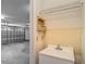Garage interior featuring an utility sink with cabinet storage and ample space at 1914 Henley Rd, Lutz, FL 33558