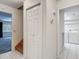 Hallway view featuring a large closet and laundry area with washer and dryer at 1914 Henley Rd, Lutz, FL 33558