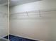 Spacious walk-in closet with ample storage space and adjustable shelving for organization at 1914 Henley Rd, Lutz, FL 33558