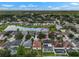 Aerial view of the neighborhood showcases the home's location near a pond and lush greenery at 1933 Fruitridge St, Brandon, FL 33510
