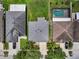 Bird's eye view of rooftops, driveways, and green spaces in a neighborhood at 1933 Fruitridge St, Brandon, FL 33510