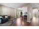 Spacious living room with hardwood floors, neutral walls, and bright windows offers a welcoming atmosphere at 1933 Fruitridge St, Brandon, FL 33510