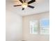 Bedroom with ceiling fan and views from two windows at 212 Shell Creek Ct, Apollo Beach, FL 33572