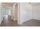 Modern hallway with neutral paint, tile floors, and recessed lighting at 212 Shell Creek Ct, Apollo Beach, FL 33572