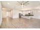 Bright, open-concept kitchen featuring stainless steel appliances, granite countertops, and a large island at 212 Shell Creek Ct, Apollo Beach, FL 33572