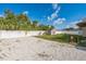 Fenced backyard features a utility shed and a large gravel area at 2204 78Th W St, Bradenton, FL 34209