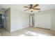 Spacious bedroom includes a ceiling fan, ample closet space, and light wood-look floors at 2204 78Th W St, Bradenton, FL 34209