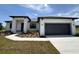 Beautiful modern home with a two-car garage, landscaped yard, and contemporary design at 2402 Hiers Rd, Dover, FL 33527
