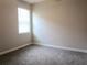 Neutral bedroom with carpet and a window at 24815 Lambrusco Loop, Lutz, FL 33559