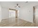 Spacious bedroom with hardwood floors and a sliding door closet at 2554 Lake Ellen Cir, Tampa, FL 33618