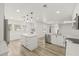 Bright, open kitchen with a large island, stainless steel appliances, and ample counter space at 2554 Lake Ellen Cir, Tampa, FL 33618