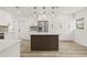 Modern kitchen featuring white cabinetry and stainless appliances at 2554 Lake Ellen Cir, Tampa, FL 33618