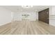 Bright, spacious living room with wood floors and lots of natural light at 2554 Lake Ellen Cir, Tampa, FL 33618