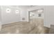 Spacious living room with hardwood floors and an open layout at 2554 Lake Ellen Cir, Tampa, FL 33618