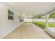 Relax in the expansive screened patio, perfect for outdoor living and entertaining at 2554 Lake Ellen Cir, Tampa, FL 33618