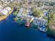 Aerial view of townhomes with waterfront access and private docks on a beautiful lake at 2648 Sabal Springs Dr # 2, Clearwater, FL 33761