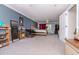 Spacious main bedroom featuring a walk out sliding glass door and exercise equipment at 2648 Sabal Springs Dr # 2, Clearwater, FL 33761
