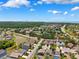 Beautiful aerial view of the community, featuring lovely homes, ponds, and verdant landscaping at 2708 Dolphin Watch Ct, Holiday, FL 34691