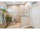Bathroom features a walk in shower with tiled walls and granite bench seating at 2708 Dolphin Watch Ct, Holiday, FL 34691