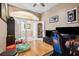Bright bonus room with hardwood floors and french doors at 2708 Dolphin Watch Ct, Holiday, FL 34691
