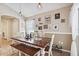 Dining room shows the light fixture and decorations hanging on the wall at 2708 Dolphin Watch Ct, Holiday, FL 34691