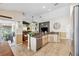 Kitchen showcases granite countertops, tile flooring, and stainless steel appliances at 2708 Dolphin Watch Ct, Holiday, FL 34691