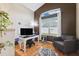 Bright home office with hardwood floors and large windows at 2708 Dolphin Watch Ct, Holiday, FL 34691