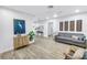 Bright, modern living room with light wood floors and recessed lighting at 300 33Rd N Ave, St Petersburg, FL 33704