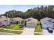 Inviting one story home with a well-groomed lawn, concrete driveway and a convenient 2-car garage at 30918 Burleigh Dr, Wesley Chapel, FL 33543