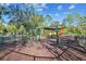 View of the community playground with swings, slides, and a shaded area for children to enjoy at 30918 Burleigh Dr, Wesley Chapel, FL 33543