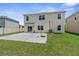 Backyard featuring a patio and a basketball hoop, perfect for outdoor activities and relaxation at 30936 Summer Sun Loop, Wesley Chapel, FL 33545